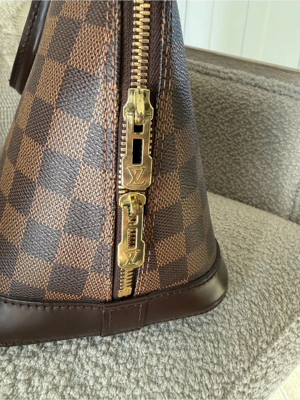 Louis Vuitton imperfections lock